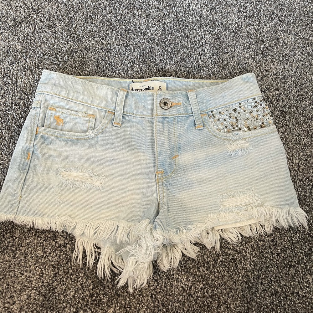 Barely worn sequined pocket light distressed jean shorts